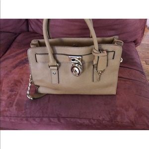 Michael Kors bag - slightly used . Get it now!